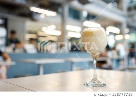 Cup of creation coffee drink in wine glass. 138777719