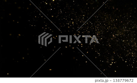 Freeze Motion Shot of Golden Glitter Background Isolated on Black Freeze Motion Shot of Golden Glitter Background Isolated on Black 138779672