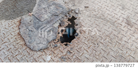 Rusty metal sheet with hole caused by water damage and long term moisture exposure Rusty metal sheet with hole caused by water damage and long term moisture exposure 138779727