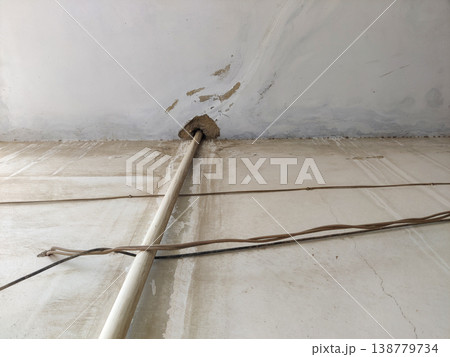 Pipe leakage on roof causing water seepage damage 138779734