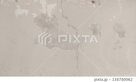 Peeling paint on cracked wall surface with signs of decay Peeling paint on cracked wall surface with signs of decay 138780062