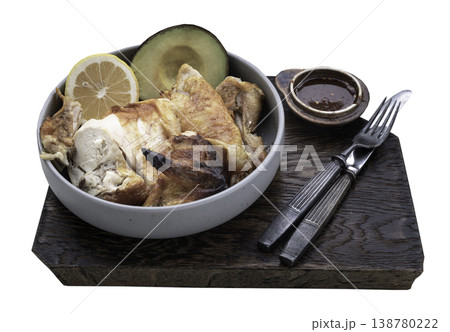 Succulent roasted chicken, its skin a honeyed bronze, reveals tender ivory meat artfully paired with a silky avocado half. A vibrant lemon. Succulent roasted chicken, its skin a honeyed bronze, reveals tender ivory meat artfully paired with a silky avocado half. A vibrant lemon. 138780222