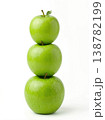 Geometric Stack of Three Different Green Apples with Stems Isolated on a Solid White Background 138782199