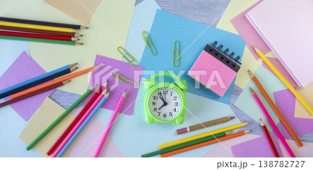 Flat lay colorful alarm clock and stationery and office supplies. Concept of learning, back to school. 138782727