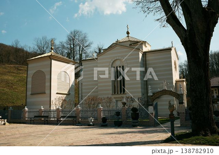 Orthodox church building of Ribnica Monastery in peaceful rural landscape near Mionica Serbia. Historic religious architecture representing faith spirituality heritage culture and pilgrimage tourism Orthodox church building of Ribnica Monastery in peaceful rural landscape near Mionica Serbia. Historic religious architecture representing faith spirituality heritage culture and pilgrimage tourism 138782910