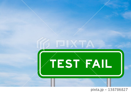 Green color transportation sign with word test fail on blue sky with white cloud background 138786827