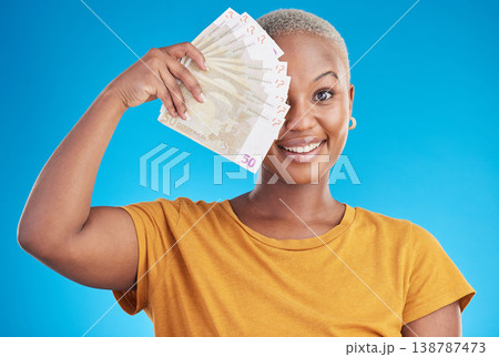 Black woman, cash fan and portrait, happy with prize and finance, loan and euros isolated on blue background. Money, cashback and lottery win with payment, financial freedom and bills with bonus Black woman, cash fan and portrait, happy with prize and finance, loan and euros isolated on blue background. Money, cashback and lottery win with payment, financial freedom and bills with bonus 138787473