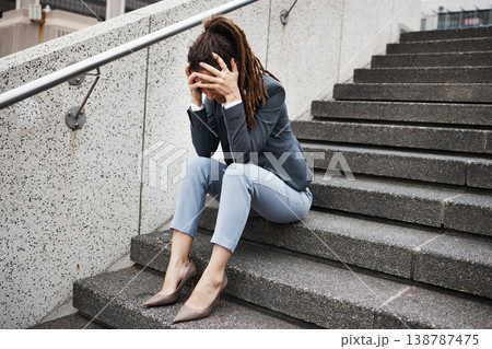 Unemployment, stairs and business with woman in city for sad, job loss and depression. Problem, stress and fear with female employee thinking in outdoors for mental health, frustrated and failure Unemployment, stairs and business with woman in city for sad, job loss and depression. Problem, stress and fear with female employee thinking in outdoors for mental health, frustrated and failure 138787475