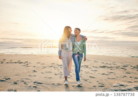 Love, beach and sunset, lesbian couple walking together on sand mockup, sunset holiday and hug on date. Lgbt women, bonding and relax on ocean vacation with romance, pride and happy nature travel. Love, beach and sunset, lesbian couple walking together on sand mockup, sunset holiday and hug on date. Lgbt women, bonding and relax on ocean vacation with romance, pride and happy nature travel. 138787738