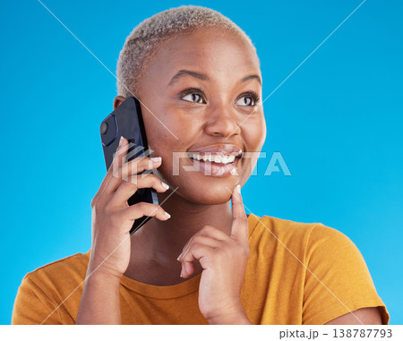Black woman, phone call and thinking of university decision, listening to news and feedback on a blue, studio background. Happy person or student on mobile communication with ideas or future planning Black woman, phone call and thinking of university decision, listening to news and feedback on a blue, studio background. Happy person or student on mobile communication with ideas or future planning 138787793