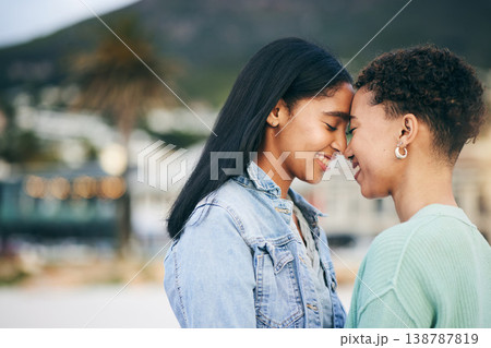 Women, lesbian and couple, hug and pride with gen z youth and romance, forehead touch outdoor. Female people together, gay relationship and lgbt with date, partner and trust with peace and support Women, lesbian and couple, hug and pride with gen z youth and romance, forehead touch outdoor. Female people together, gay relationship and lgbt with date, partner and trust with peace and support 138787819