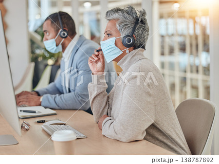 Call center, face mask and communication with business woman in office for customer service, consulting or advice. Healthcare, virus and bacteria with employee for contact, help desk or hygiene Call center, face mask and communication with business woman in office for customer service, consulting or advice. Healthcare, virus and bacteria with employee for contact, help desk or hygiene 138787892