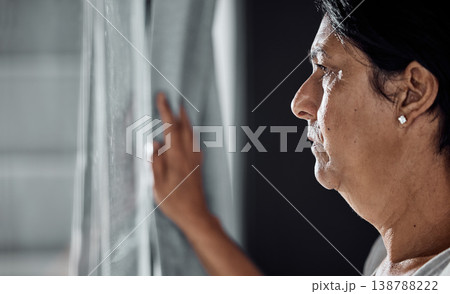 Serious, senior woman and thinking about future, window in nursing home or decision for retirement, life insurance and healthcare. Elderly person, anxiety and depression in mental health about death 138788222