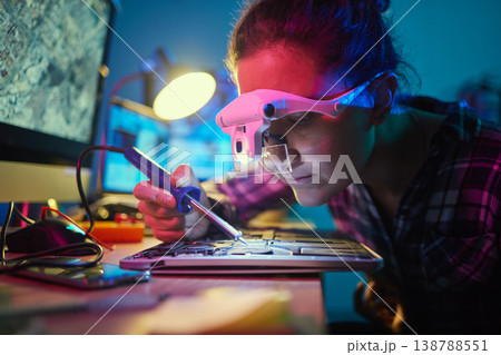 Engineer woman, motherboard and soldering iron for manufacturing, microchip and it development. Information technology, circuit board and electronics for programming, hardware and system with tools 138788551