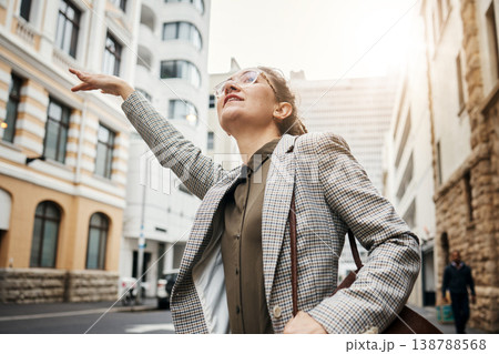 Woman in city, travel and stop taxi, commute to work with buildings, professional and transportation outdoor. Corporate female person in urban street, business clothes and journey to workplace 138788568