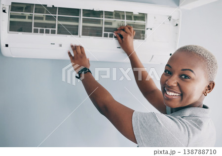 Portrait, black woman and electrician for ac repair, electrical box and fan maintenance. Happy female mechanic, technician and engineer fix power system, hvac service and air conditioning machine Portrait, black woman and electrician for ac repair, electrical box and fan maintenance. Happy female mechanic, technician and engineer fix power system, hvac service and air conditioning machine 138788710