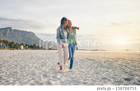 Love, beach and lesbian couple hug while walking together on sand, sunset holiday adventure or date. Lgbt women, bonding and relax on ocean vacation with romance, pride and happy travel in nature. Love, beach and lesbian couple hug while walking together on sand, sunset holiday adventure or date. Lgbt women, bonding and relax on ocean vacation with romance, pride and happy travel in nature. 138788753