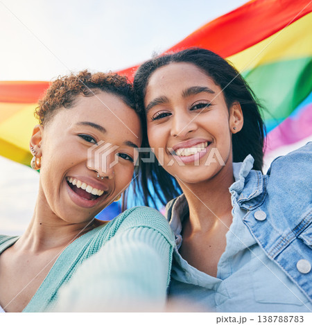 Portrait, couple and lesbian with women in selfie, pride flag and lgbt relationship, happiness outdoor. Female people smile in picture, gen z youth and gay equality, support and trust with partner Portrait, couple and lesbian with women in selfie, pride flag and lgbt relationship, happiness outdoor. Female people smile in picture, gen z youth and gay equality, support and trust with partner 138788783