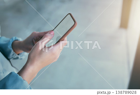 Phone, mockup and hands of business person in office for social media, internet and mobile space. Technology, professional and closeup of worker on smartphone for website, branding and advertisement 138789028