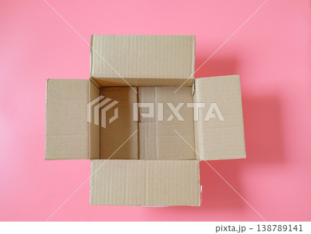 Opened cardboard box on top view. Opened cardboard box on top view. 138789141