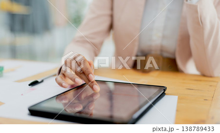 Worker, hands or tablet in office for online in office for schedule, business website or project research. Email, internet closeup or woman typing on touchscreen, app or technology for social media 138789433