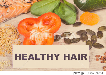 Nutritious products or ingredients containing vitamins and minerals for healthy and lush hair Nutritious products or ingredients containing vitamins and minerals for healthy and lush hair 138789781