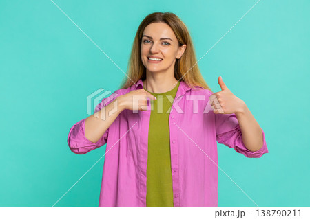 Woman pointing to herself with confident smile showing pride motivation asking to be chosen first Woman pointing to herself with confident smile showing pride motivation asking to be chosen first 138790211