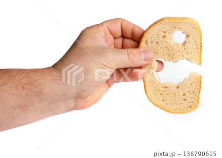 Hand Showing Bread Slice with Hole Hand Showing Bread Slice with Hole 138790615