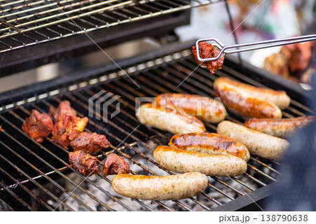 Meat and Sausages Grilling Outdoors 138790638