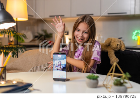 Teenager girl recording short social media video on smartphone dancing with funny gestures happy fun Teenager girl recording short social media video on smartphone dancing with funny gestures happy fun 138790728