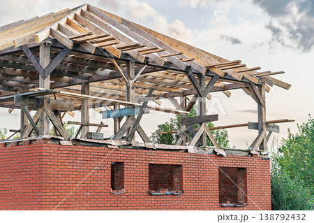 House construction of red brick first floor and wooden structure for the second floor House construction of red brick first floor and wooden structure for the second floor 138792432