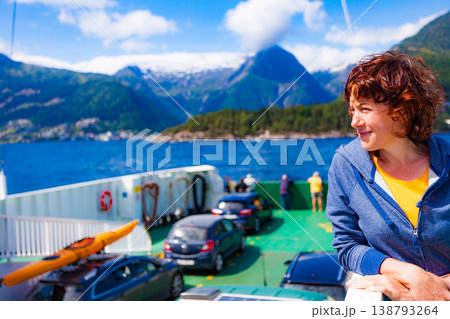 Tourist woman on ferryboat, Norway Tourist woman on ferryboat, Norway 138793264