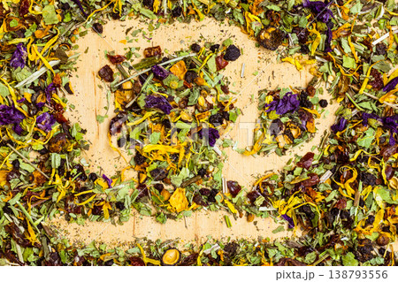 Assorted natural medical herbs with tea cup shape Assorted natural medical herbs with tea cup shape 138793556