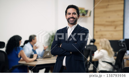 Manager smiling confident business professional standing in office 138793936