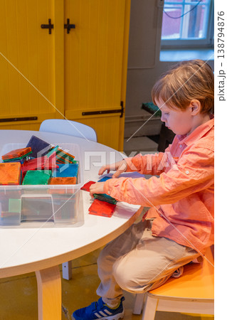 Child Learning with Colorful Building Blocks and Magnetic Tiles. Child Learning with Colorful Building Blocks and Magnetic Tiles. 138794876