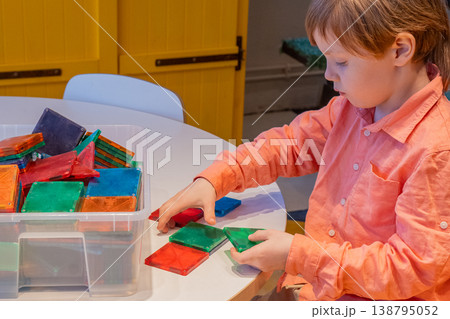 Child Learning with Colorful Building Blocks and Magnetic Tiles. Child Learning with Colorful Building Blocks and Magnetic Tiles. 138795052