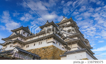 Himeji, Japan - Sep 24 2024, panoramic view of Himeji Castle, White Heron Castle from below, at daytime with blue sky and clouds, without people, Himeji, Japan Himeji, Japan - Sep 24 2024, panoramic view of Himeji Castle, White Heron Castle from below, at daytime with blue sky and clouds, without people, Himeji, Japan 138799375