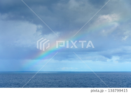 Sakata, Yamagata, Japan - Oct 5 2024, panoramic aerial view of the sea, a rainbow is visible among the clouds, at daytime, Sakata, Japan Sakata, Yamagata, Japan - Oct 5 2024, panoramic aerial view of the sea, a rainbow is visible among the clouds, at daytime, Sakata, Japan 138799415
