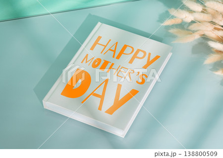 Happy Mother's Day celebration on May 10 with a colorful card on a table 138800509