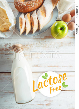 Lactose and gluten free foods on a wooden table with milk and baked items 138800518