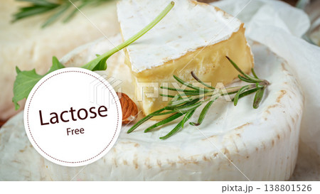 Cheese on a plate with herbs shows lactose free options for snacks and meals 138801526