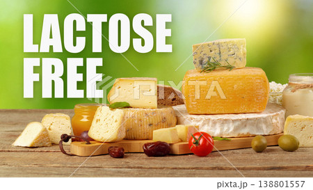 Lactose free cheese display with various types of cheese and fresh ingredients on wooden table Lactose free cheese display with various types of cheese and fresh ingredients on wooden table 138801557
