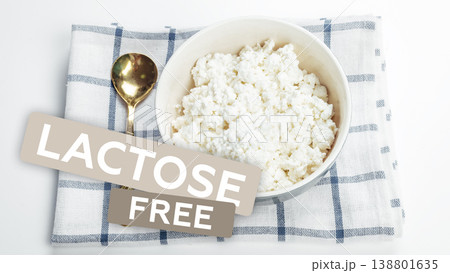 Creamy cottage cheese served on a dish with a spoon for a healthy meal option 138801635