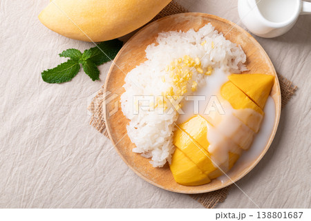 Mango sticky rice (Khao Niew Mamuang) with coconut milk and crispy mung beans Mango sticky rice (Khao Niew Mamuang) with coconut milk and crispy mung beans 138801687