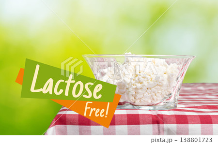 Lactose free food served in a glass bowl on a checkered tablecloth outdoors 138801723