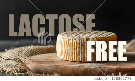 Lactose free cheese on wooden board with burlap background during daylight 138801778
