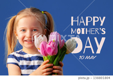 Celebrating Mother's Day with a child holding flowers on May 10 138801804