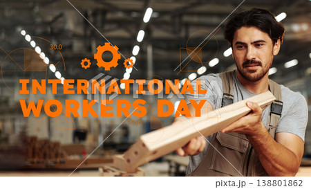 Workers in a factory celebrate International Workers Day on May 1 while engaging in their tasks 138801862