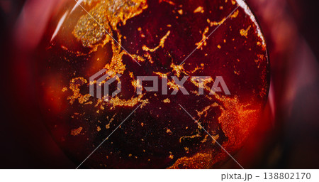 Sphere paint spatter. Flow blend. Defocused yellow purple golden color acrylic glitter particles floating on abstract creative art background. Sphere paint spatter. Flow blend. Defocused yellow purple golden color acrylic glitter particles floating on abstract creative art background. 138802170