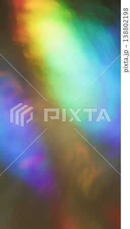 Film blur lens. Glowing background. Yellow blue purple illuminated colorful texture. Spectrum leak overlay abstract burn reflection on dark. Film blur lens. Glowing background. Yellow blue purple illuminated colorful texture. Spectrum leak overlay abstract burn reflection on dark. 138802198